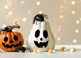 Two painted Halloween pumpkins.