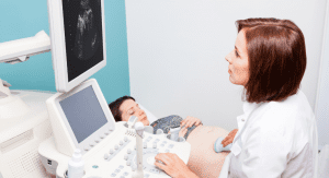 A woman having an ultrasound.
