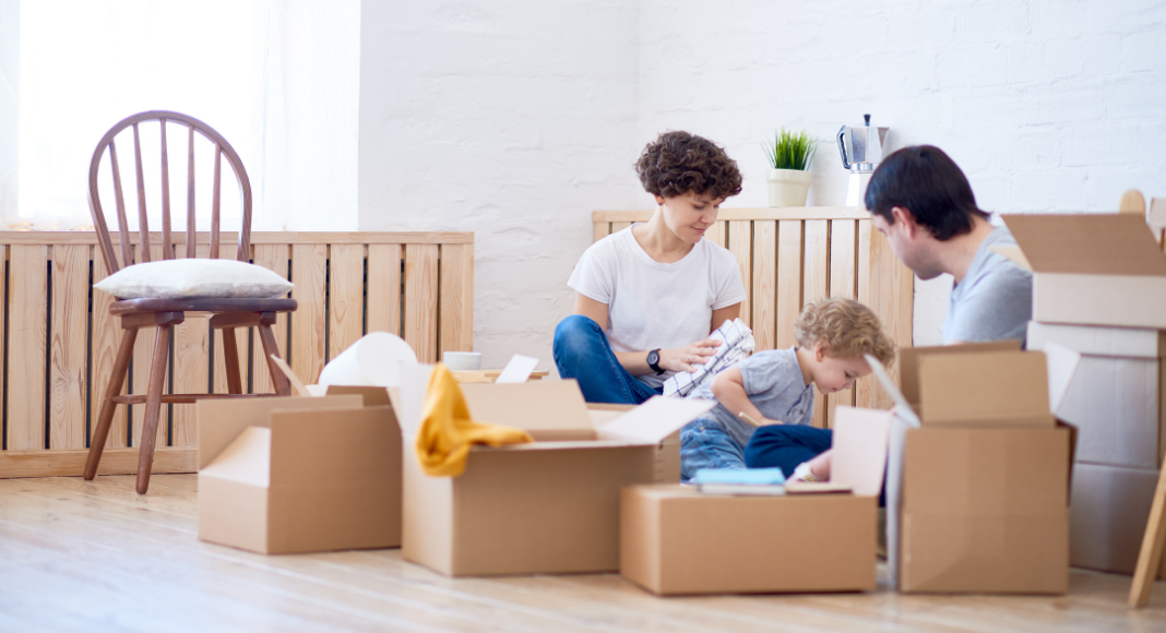 A family packing boxes.