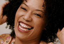 A woman laughing.