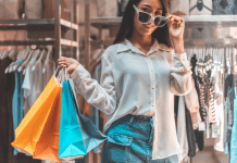 A girl carrying shopping bags.