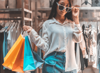 A girl carrying shopping bags.