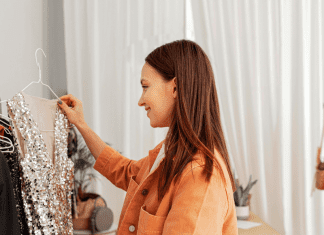 A woman looking at a New Year's Eve dress.